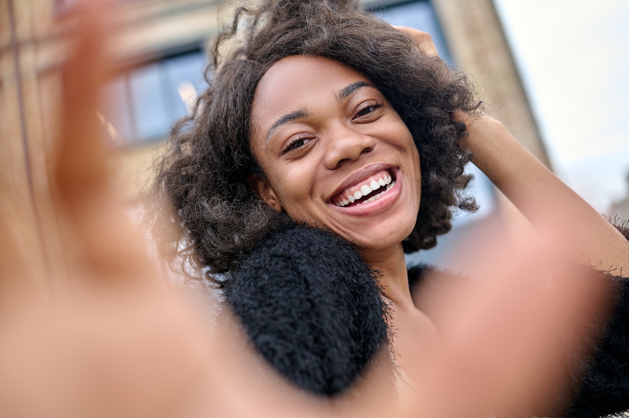 Cute young woman feeling happy and looking excited